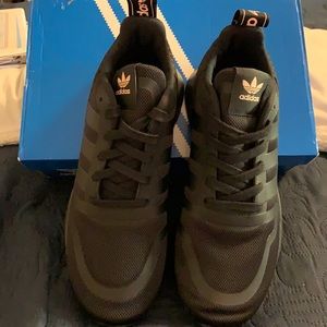 Adidas Women’s Black Shoes.